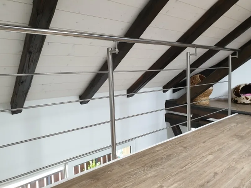 Kernsanierung Rieghaus Thun – Galerieausbau mit Edelstahlgeländer, neue Tragstruktur und Innenausbau